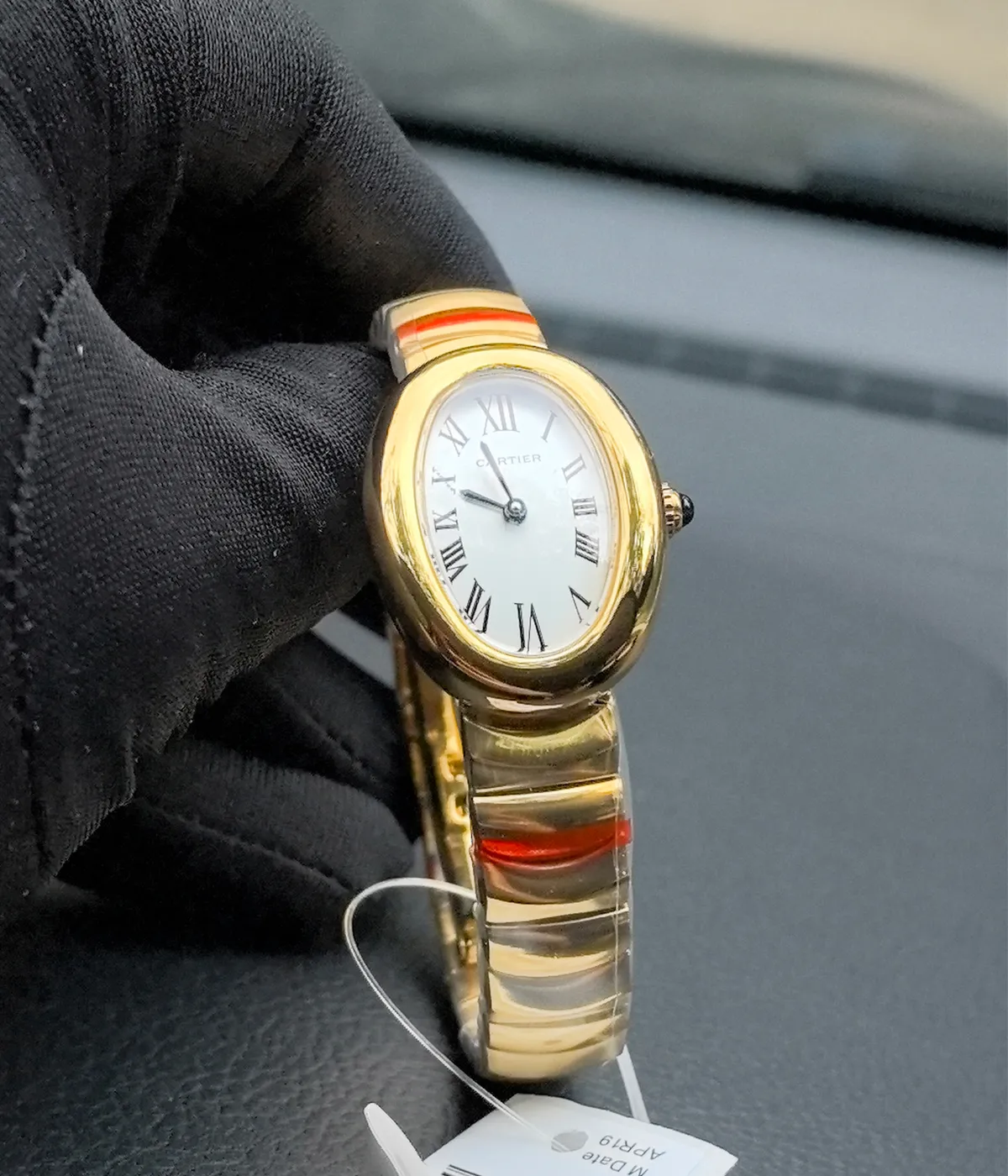 Front view of the Cartier Baignoire Small Model sapphire yellow gold women's watch.