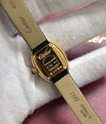 View of the caseback of the Cartier Baignoire WGBA0017 Small Model Sapphire Yellow Gold Women's Watch.