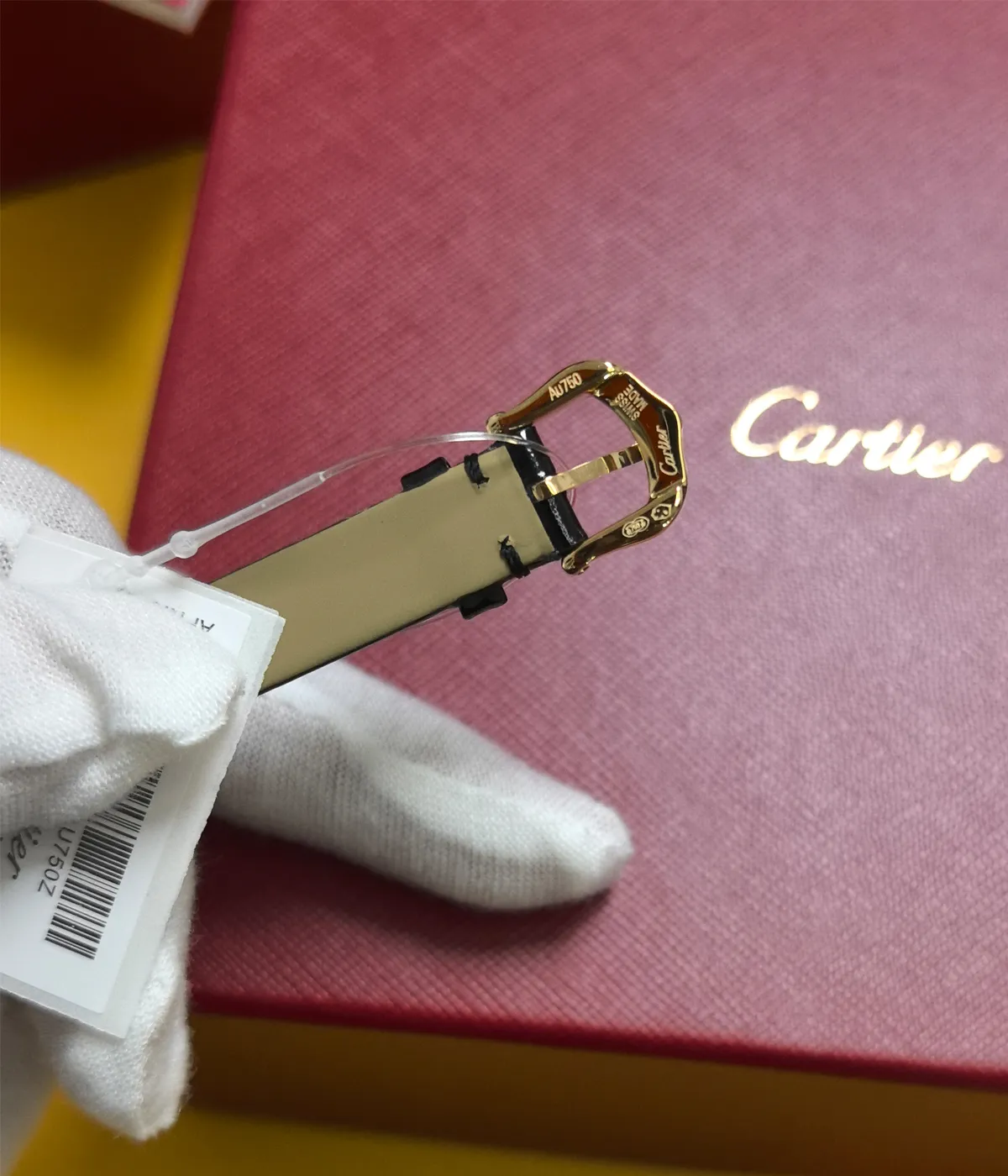 Close-up of the clasp on the Cartier Baignoire WGBA0017 Small Model Sapphire Yellow Gold Women's Watch.