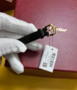 View of the clasp and bracelet of the Cartier Baignoire WGBA0017 Small Model Sapphire Yellow Gold Women's Watch.