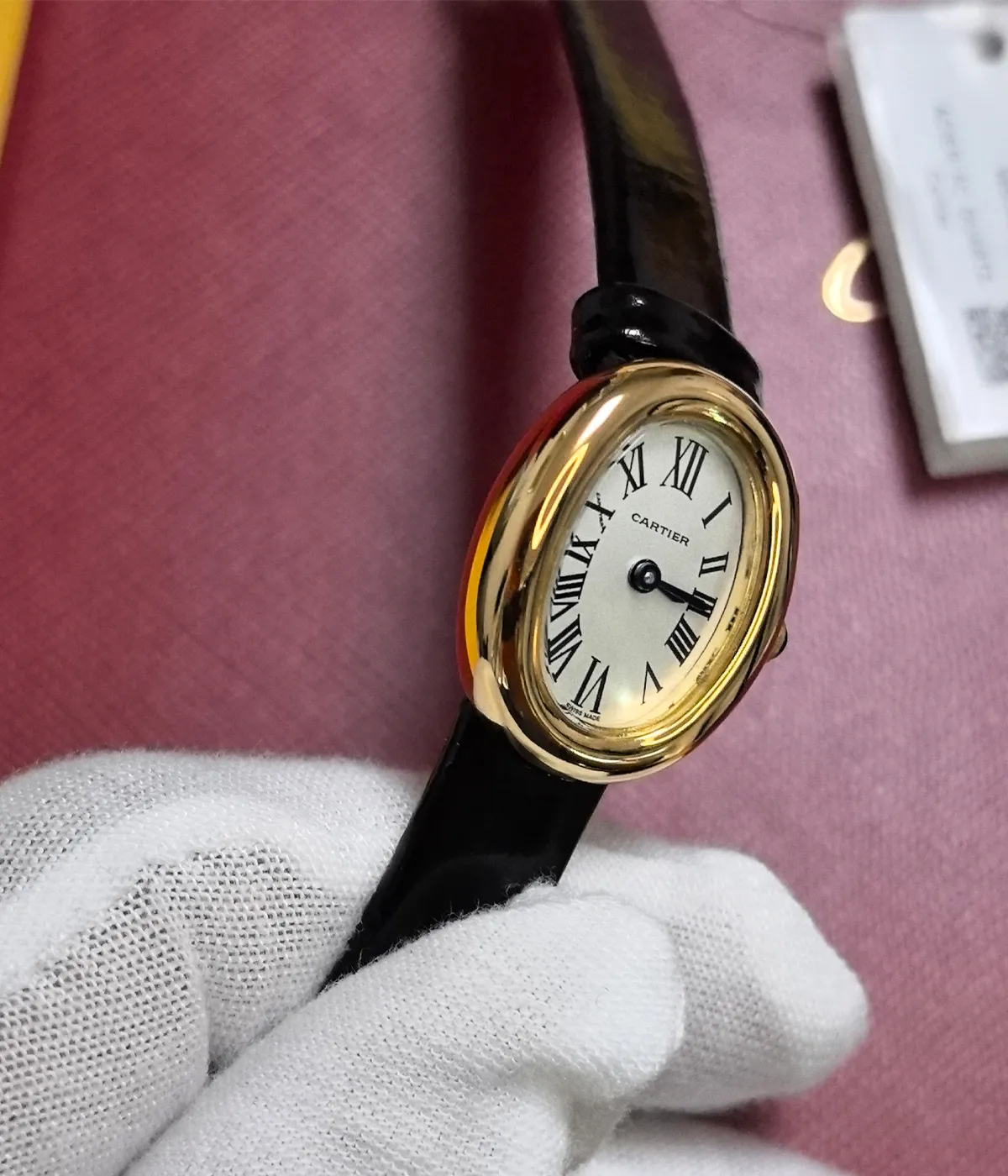 Close-up of the micro-measurement feature on the Cartier Baignoire WGBA0017 Small Model Sapphire Yellow Gold Women's Watch.