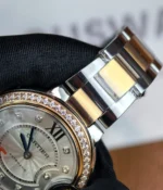 Detailed view of the bracelet on the Cartier Ballon Bleu De Two Tone Rose Gold and Steel 36MM Diamond Set watch.