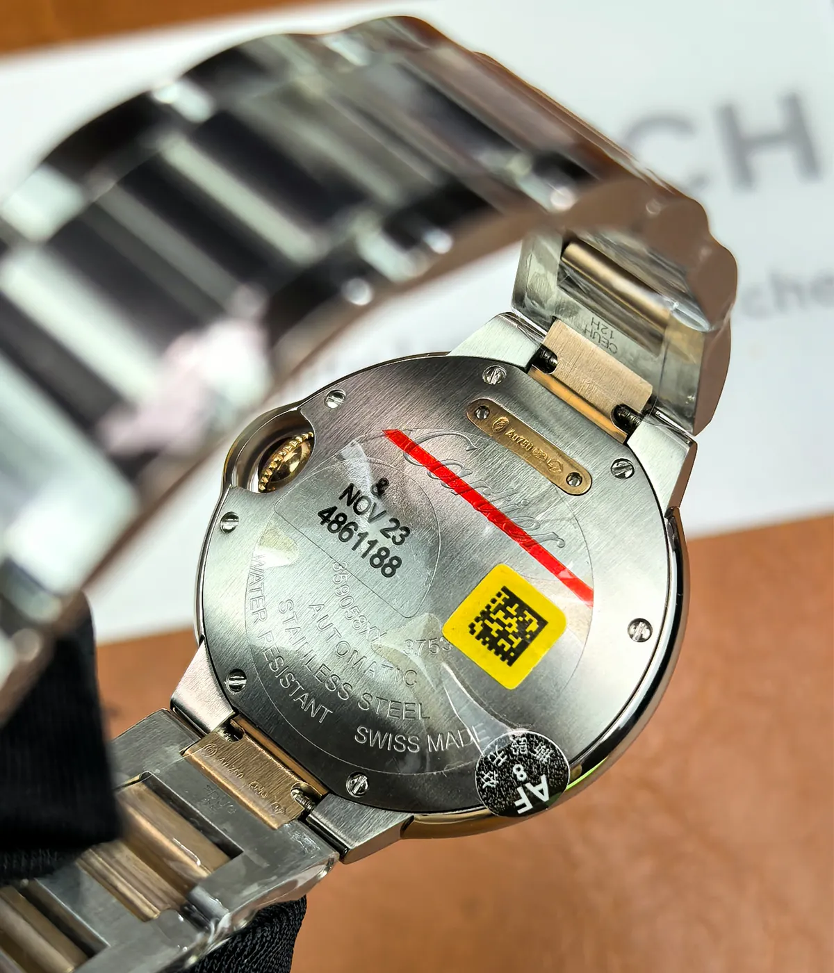 Close-up view of the movement area inside the Cartier Ballon Bleu De Two Tone Rose Gold and Steel 36MM Diamond Set watch.