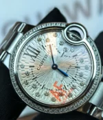 Close-up of the dial and case details on the Cartier Ballon Bleu de White Dial with diamond accents women's watch.
