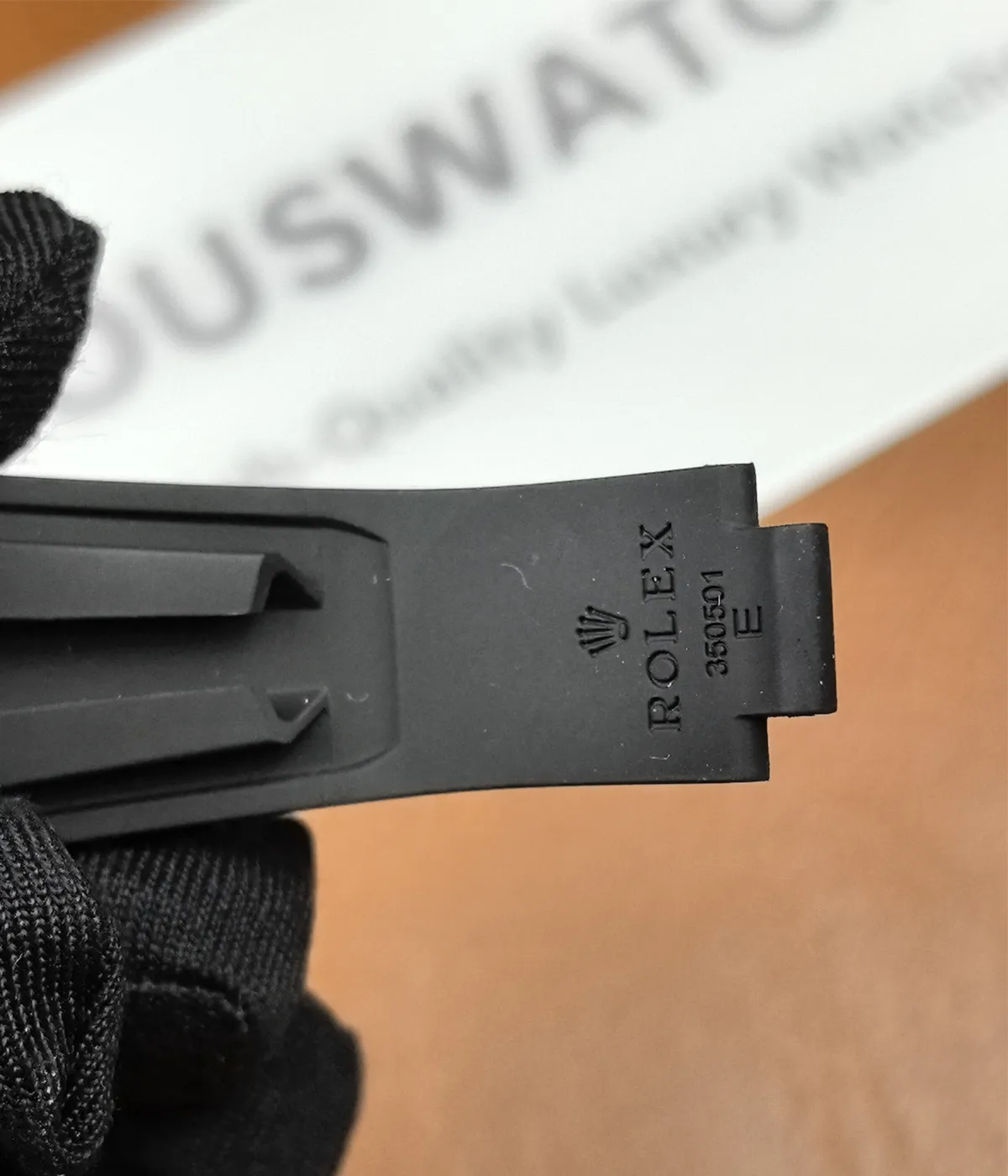 Close-up of the bracelet detail on the Golden Rolex Daytona 126518LN-0014 with an Oysterflex strap.