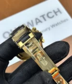 Detailed view of the clasp opened on the Golden Rolex Daytona 126518LN-0014 with an Oysterflex bracelet.