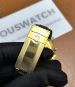 Close-up of the clasp on the Golden Rolex Daytona 126518LN-0014 with an Oysterflex bracelet.