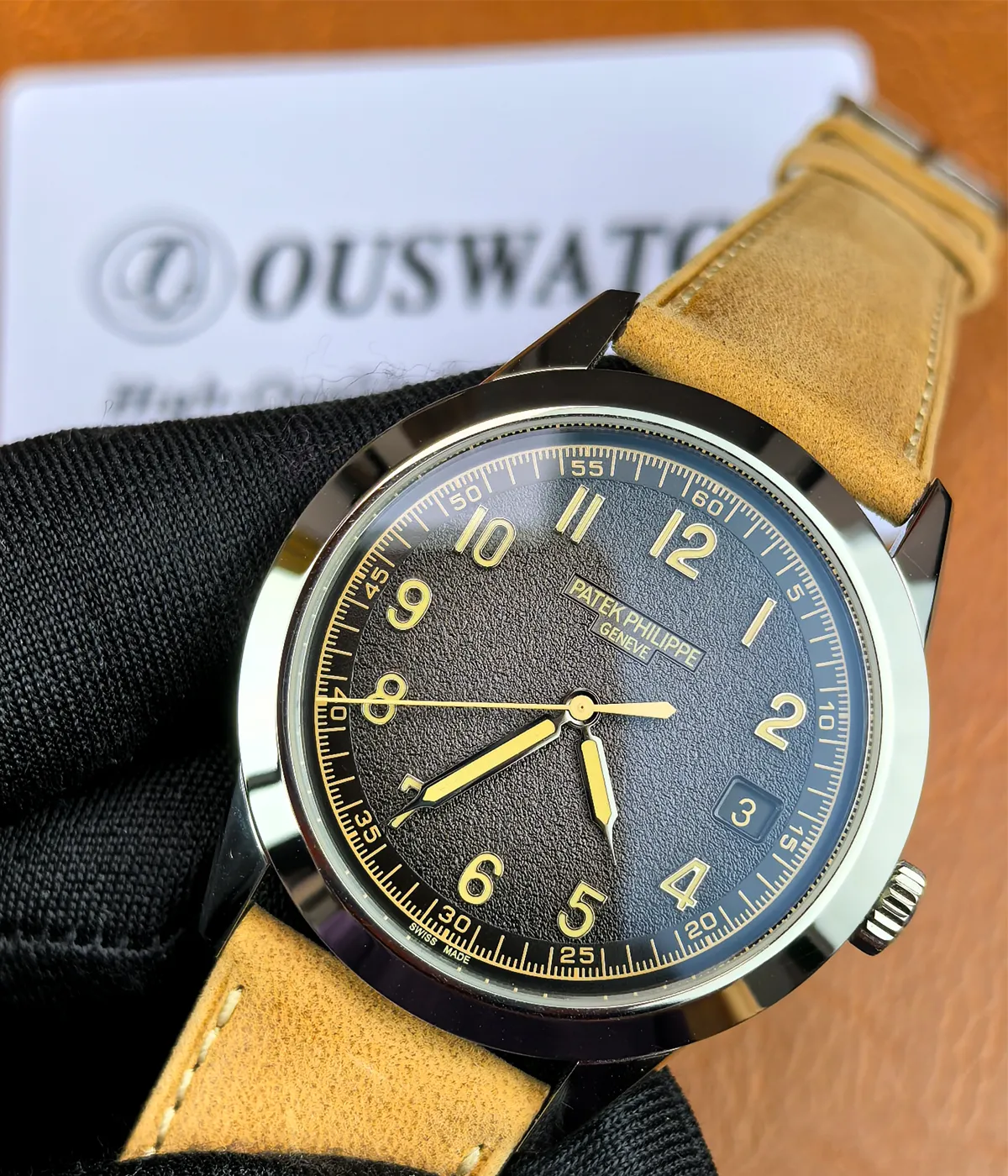 25-degree angled view of the Patek Philippe 5226G-001 Calatrava, showcasing the black dial and 18K white gold case.