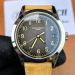 Front view of the Patek Philippe 5226G-001 Calatrava with a black dial and 18K white gold case.