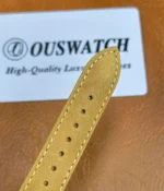 Close-up view of the bracelet of the Patek Philippe 5226G-001 Calatrava, showcasing its design and material quality.