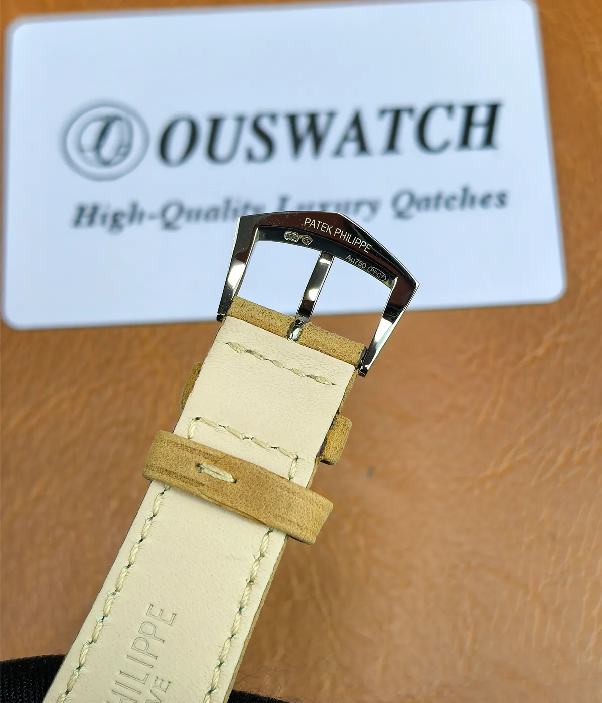 Detailed view of the clasp on the Patek Philippe 5226G-001 Calatrava, focusing on its mechanism and precision.