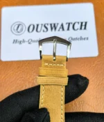 Close-up shot of the clasp on the Patek Philippe 5226G-001 Calatrava, showcasing its design and functionality.