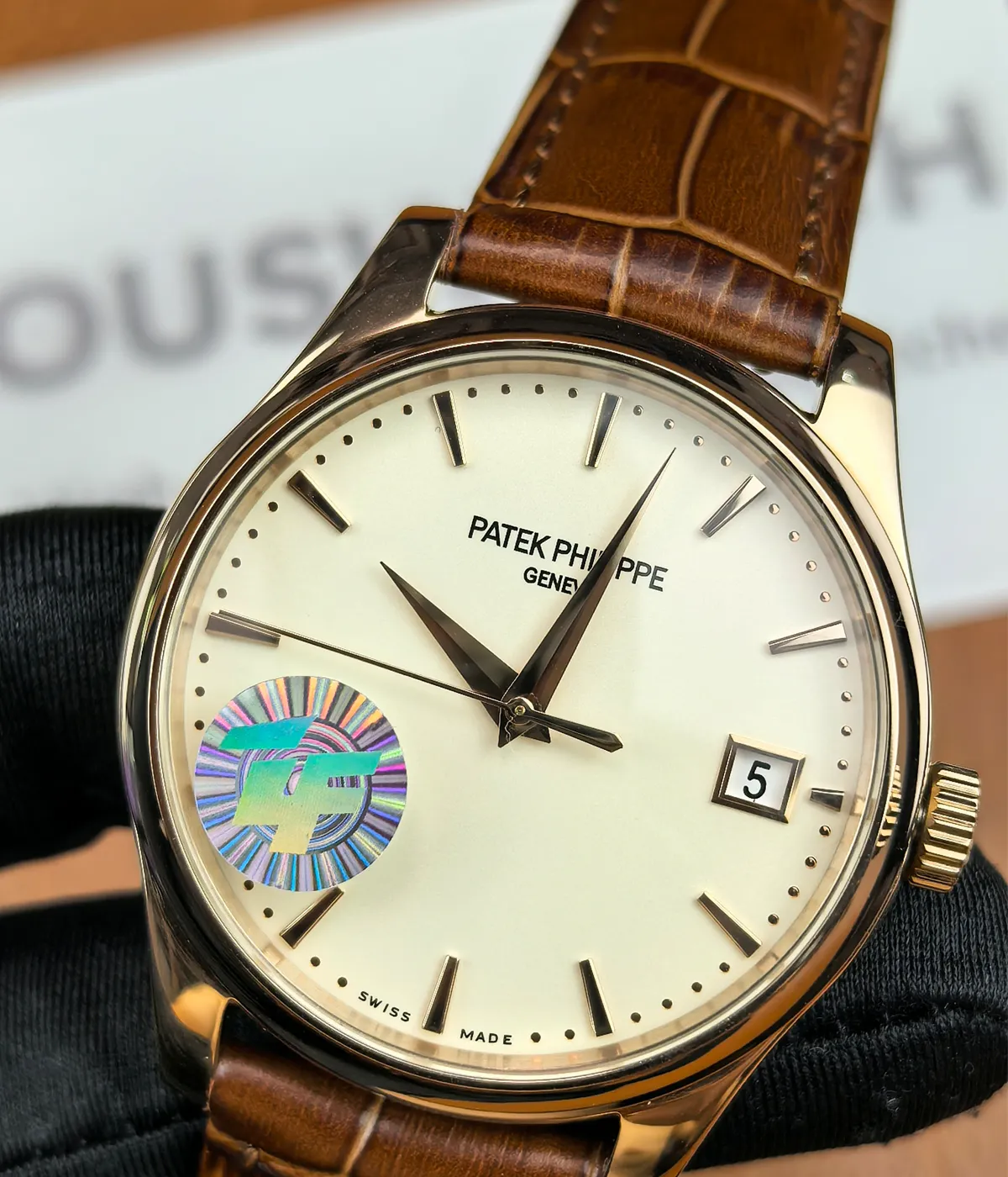 Close-up shot of the front of the Patek Philippe 5227R-001 Calatrava Rose Gold 39mm Ivory Dial, highlighting the fine craftsmanship of the dial.