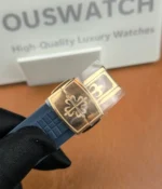 Close-up view of the buckle on the Patek Philippe 5261R-001 Aquanaut Rose Gold strap, showcasing its elegant design and craftsmanship.