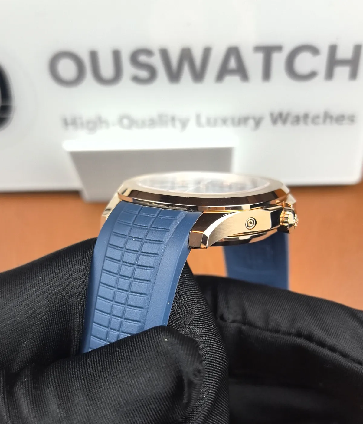 Close-up of the lugs of the Patek Philippe 5261R-001 Aquanaut Rose Gold, showcasing the smooth transition between the case and strap.