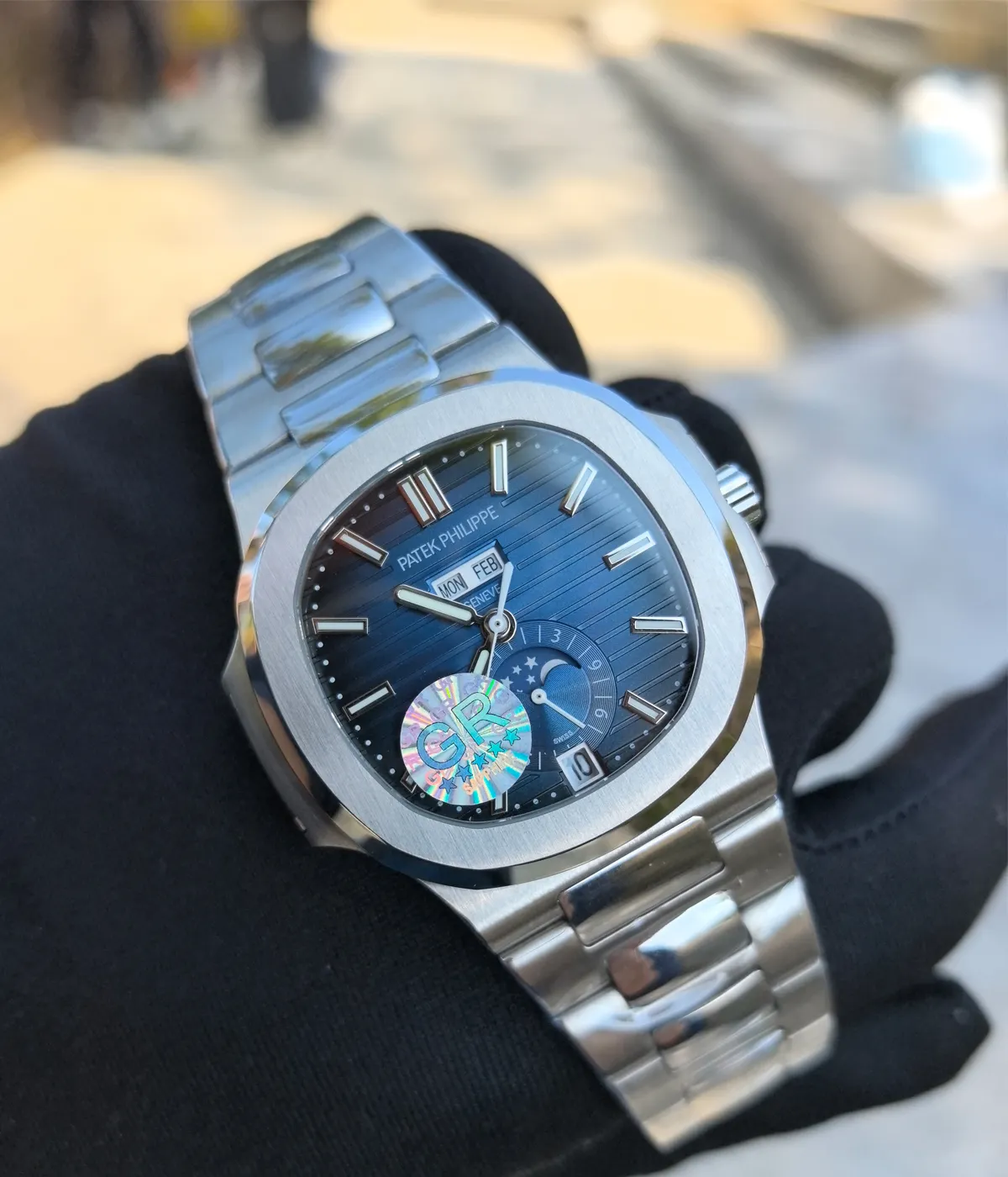 Close-up of the front dial of the Patek Philippe 5726/1A-014 Stainless Steel Blue Case 40mm, showcasing the detailed blue dial and elegant markers.