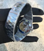 Detailed view of the mechanical movement inside the Patek Philippe 5726/1A-014 Stainless Steel Blue Case 40mm, highlighting the precision engineering and craftsmanship.