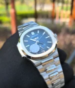 Close-up of the case and lugs of the Patek Philippe 5726/1A-014 Stainless Steel Blue Case, highlighting the clean lines and polished finish of the stainless steel.