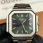 Front view of the Patek Philippe 5821/1A-001 men's watch with a green dial and steel strap.