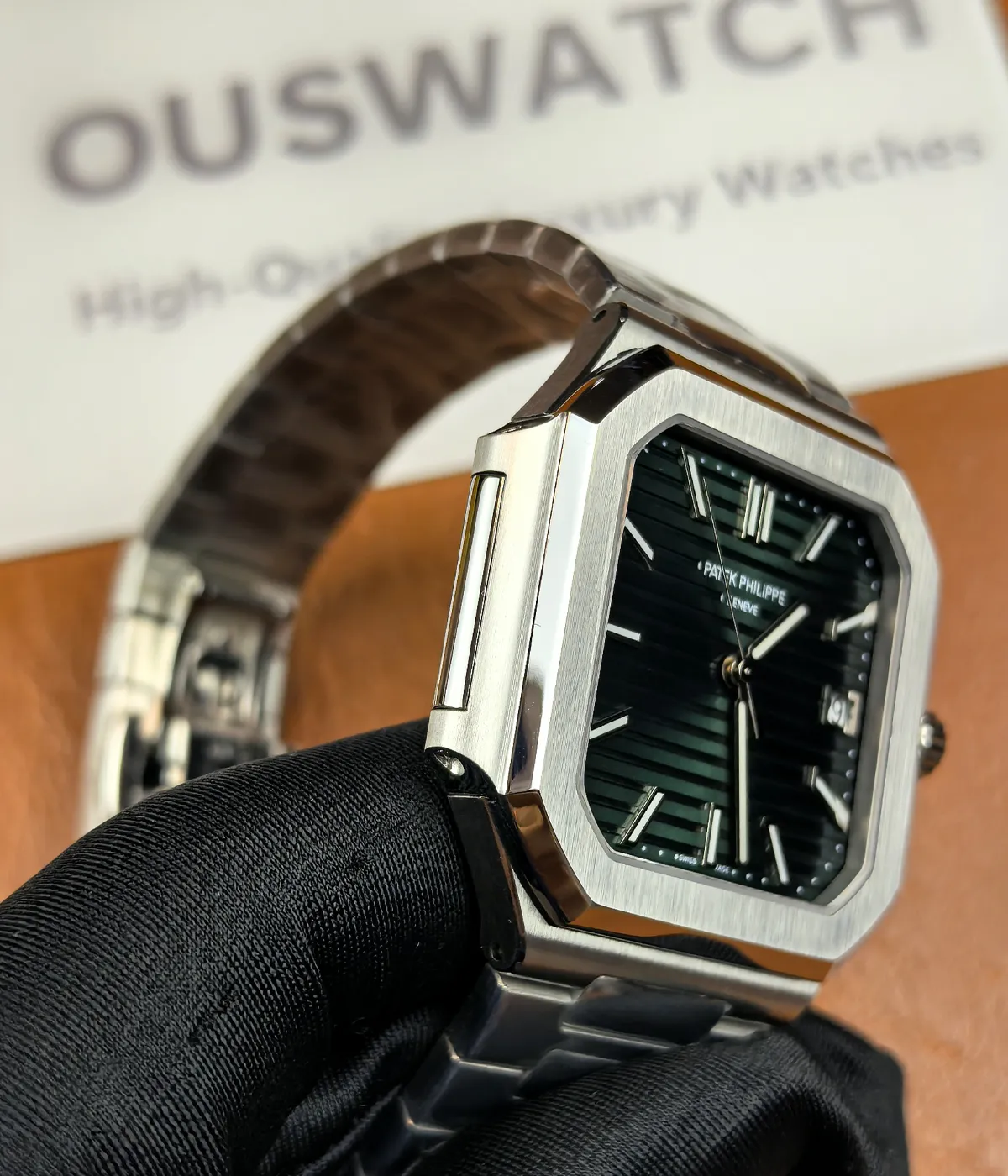 Left side view of the Patek Philippe 5821/1A-001 men's watch, showing the satin finish of the case.