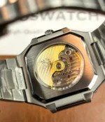 Close-up view of the movement inside the Patek Philippe 5821/1A-001 men's watch.