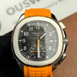Front view of the Patek Philippe 5968A-001 Aquanaut with an orange strap and black dial.