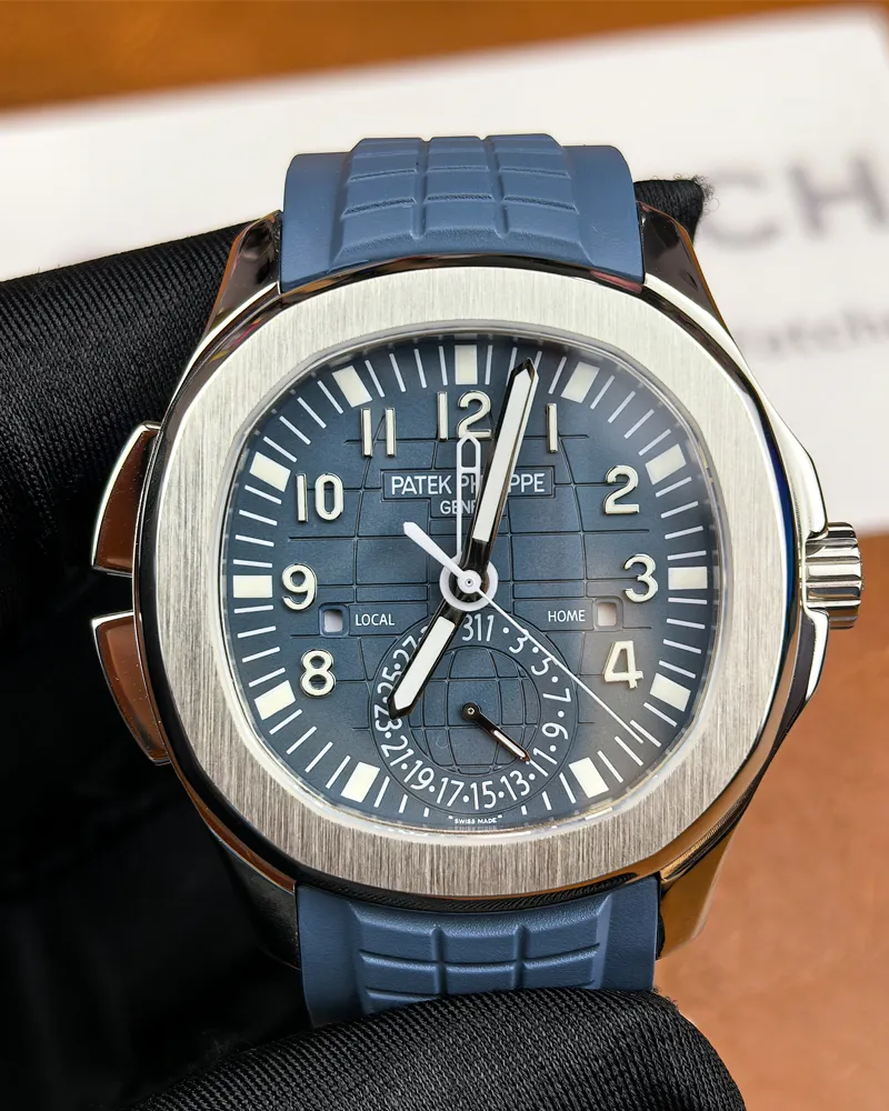 Front view of the Patek Philippe Aquanaut Travel Time 5164G-001 with a blue dial and