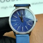 Front view of the Patek Philippe Calatrava 4897G-001 33mm women's watch with a blue dial.