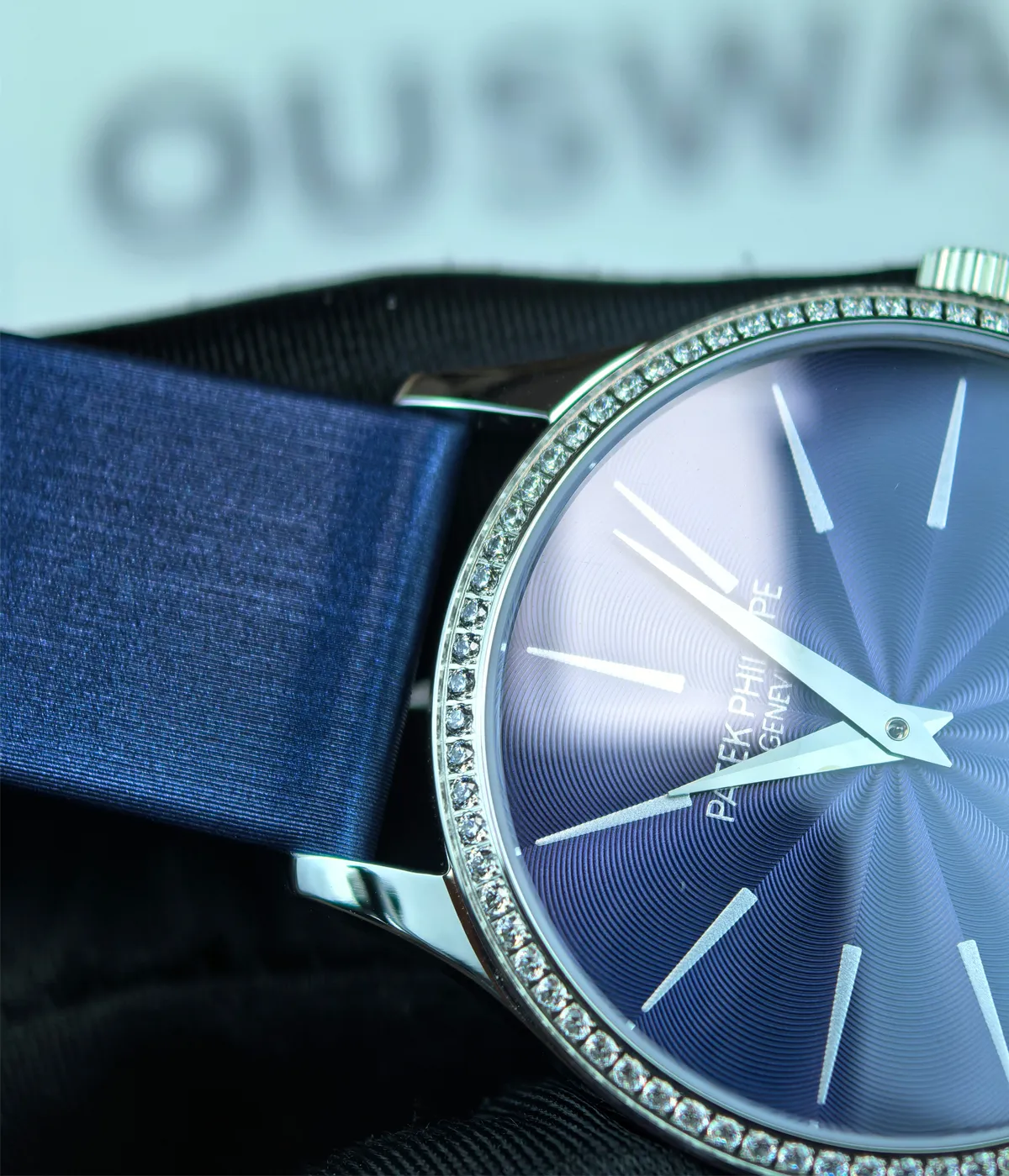 Close-up of the lugs on the Patek Philippe Calatrava 4897G-001 33mm watch, emphasizing the integration with the strap.