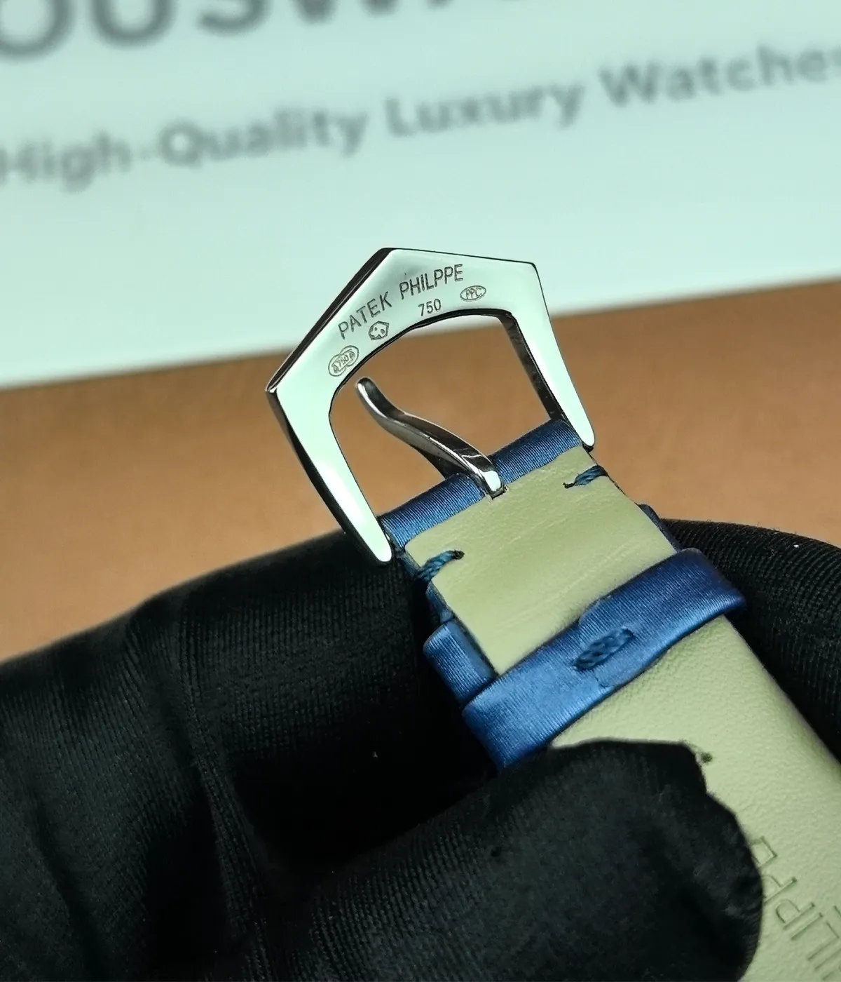 Detailed view of the clasp mechanism on the Patek Philippe Calatrava 4897G-001 33mm watch.