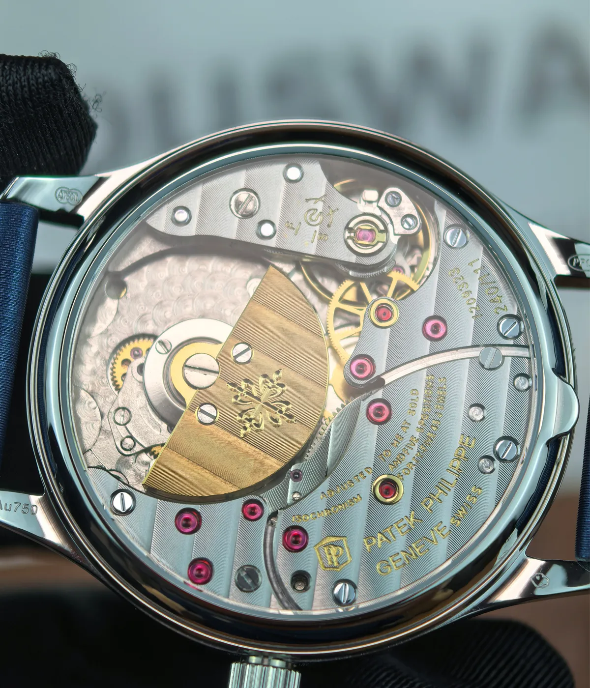 Detailed view of the movement inside the Patek Philippe Calatrava 4897G-001 33mm watch.