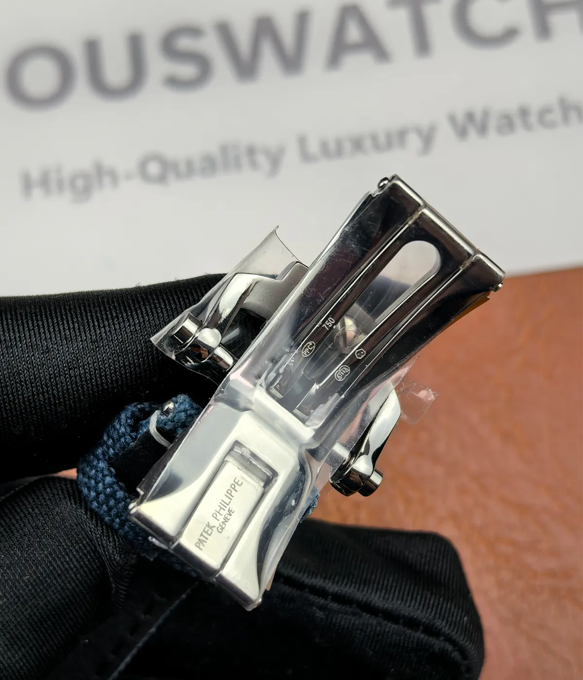 Detailed view of the clasp on the Patek Philippe Cubitus Watch 5822P-001 Blue Dial.