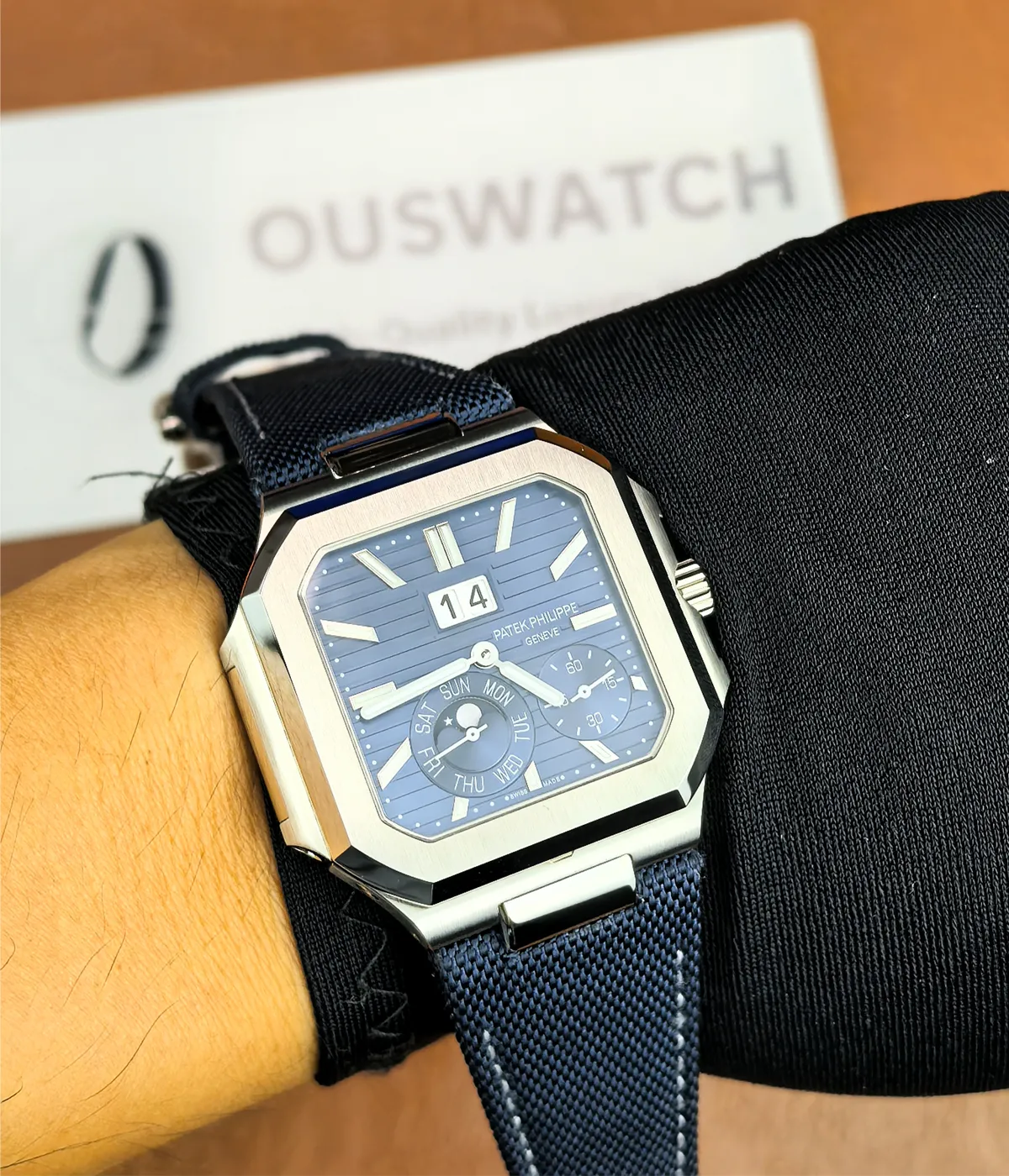 Display of the Patek Philippe Cubitus Watch 5822P-001 Blue Dial being worn on the wrist.