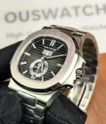 Close-up view of the crown on the Patek Philippe Nautilus 5726A-001 Moonphase Black Dial, highlighting its polished finish and functional design.