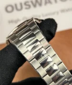 Close-up of the bracelet of the Patek Philippe Nautilus 5726A-001 Moonphase, highlighting the polished stainless steel links and elegant craftsmanship.