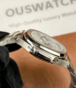 Side view of the Patek Philippe Nautilus 5726A-001 Moonphase, showcasing the satin-finished case and the sleek, smooth lines of the design.