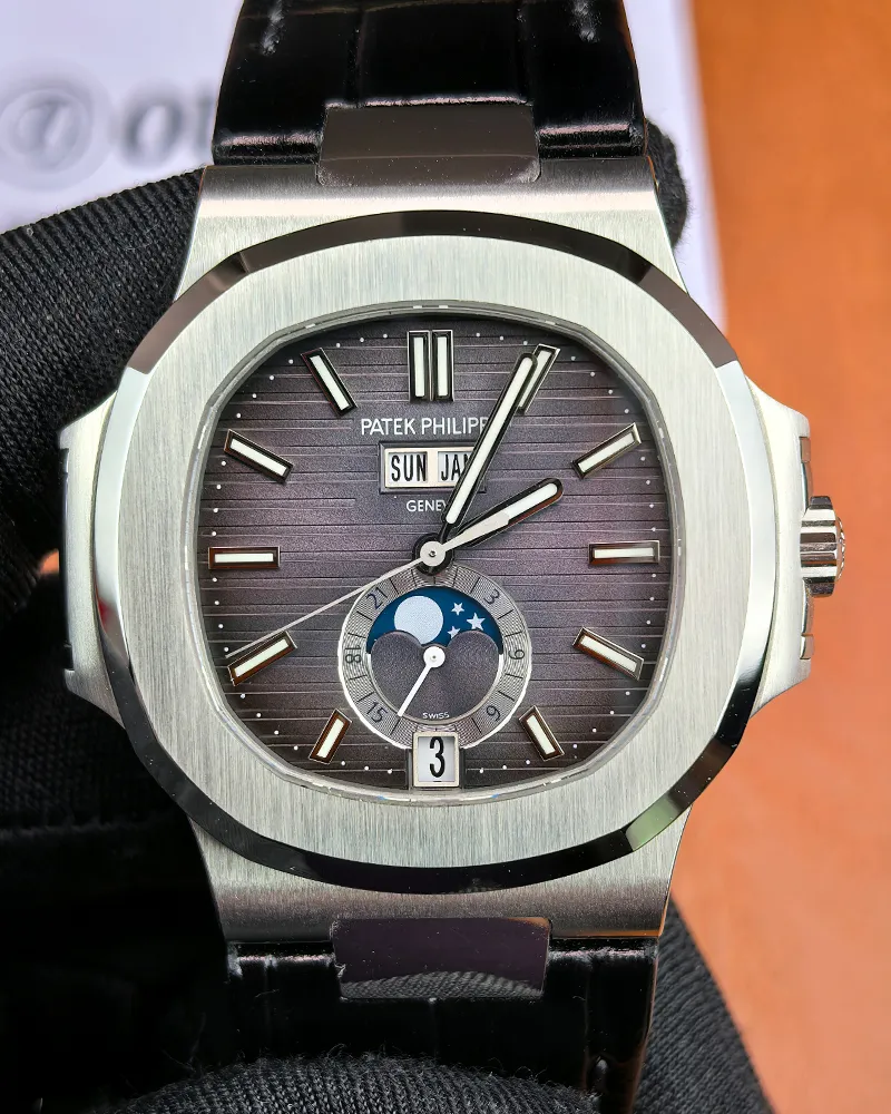 Front view of the Patek Philippe Nautilus 5726a-001 Moonphase Black Dial Men's belt replica watch.