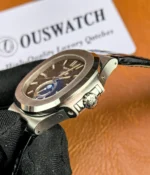 Close-up of the crown of the Patek Philippe Nautilus 5726a-001 Moonphase watch.