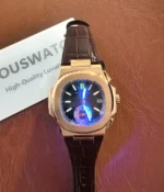 Luminous display of the Patek Philippe Nautilus 5980R-001 in rose gold with a brown dial in the dark.