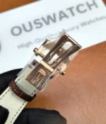 Close-up of the clasp on the Patek Philippe Nautilus 5980R-001 in rose gold.