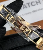 Close-up detail of the clasp on the Patek Philippe Nautilus 7118-1300R-001 rose gold watch.