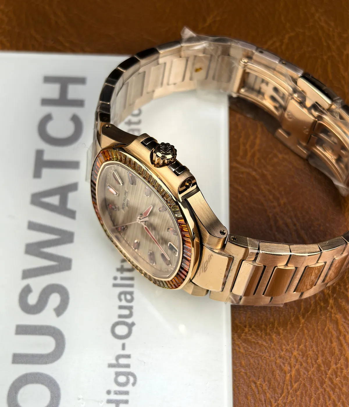 Authentic product photograph of the Patek Philippe Nautilus 7118-1300R-001 women’s watch in rose gold with ruby accents.