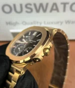 Close-up view of the crown of the Patek Philippe Nautilus Moonphase 5712-1R Rose Gold, highlighting its sleek and functional design.