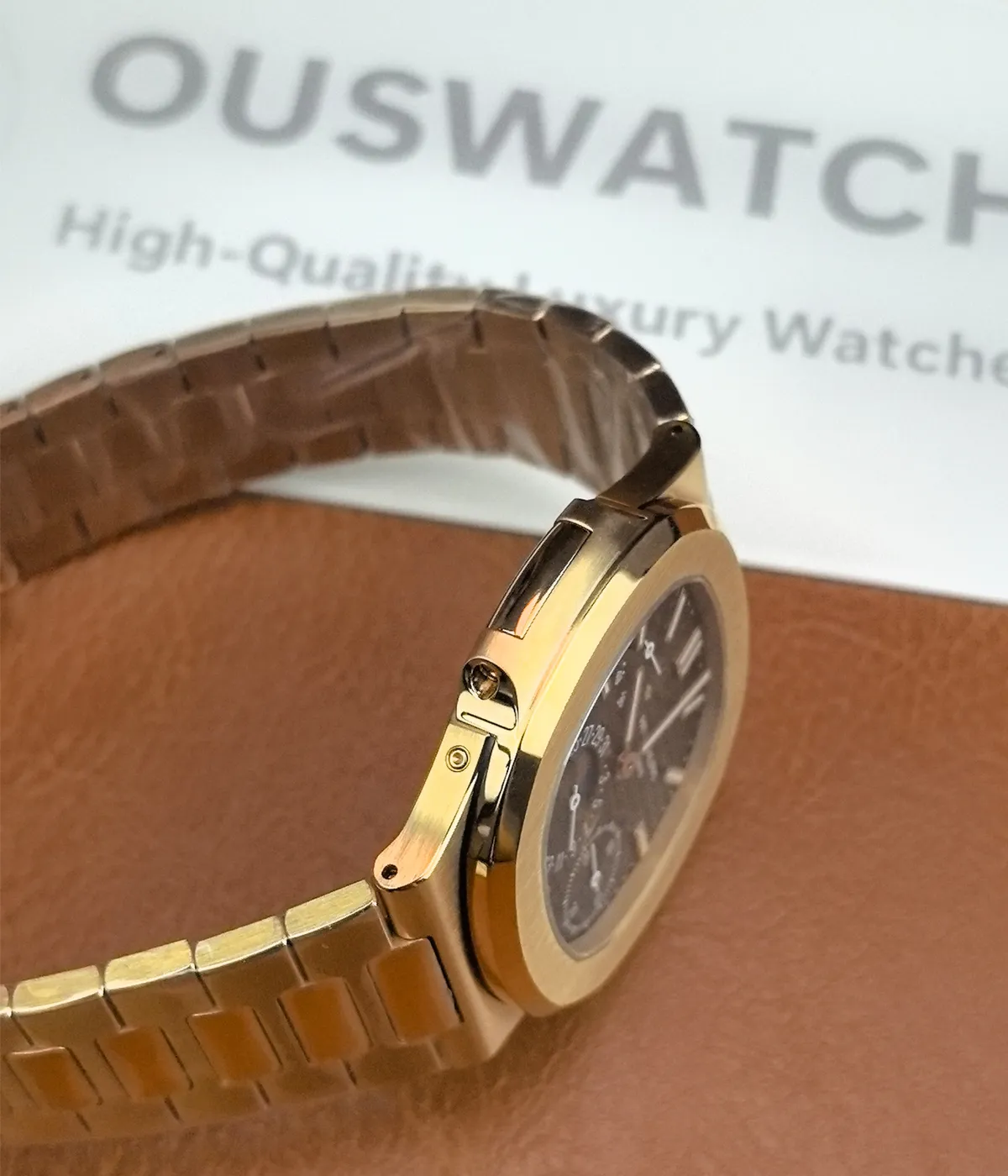 Side profile view of the Patek Philippe Nautilus Moonphase 5712-1R Rose Gold, showcasing the slim profile and elegant curvature of the case.