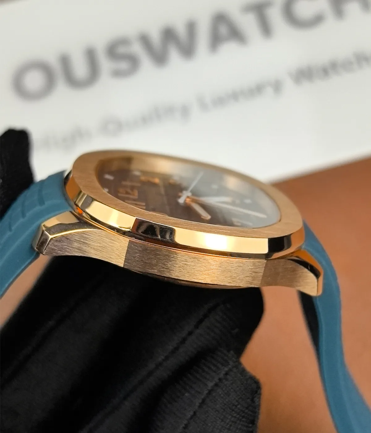 Side view of the Patek Philippe Rose Gold Aquanaut 5269R-001, highlighting the satin finish on the case and the sleek design.