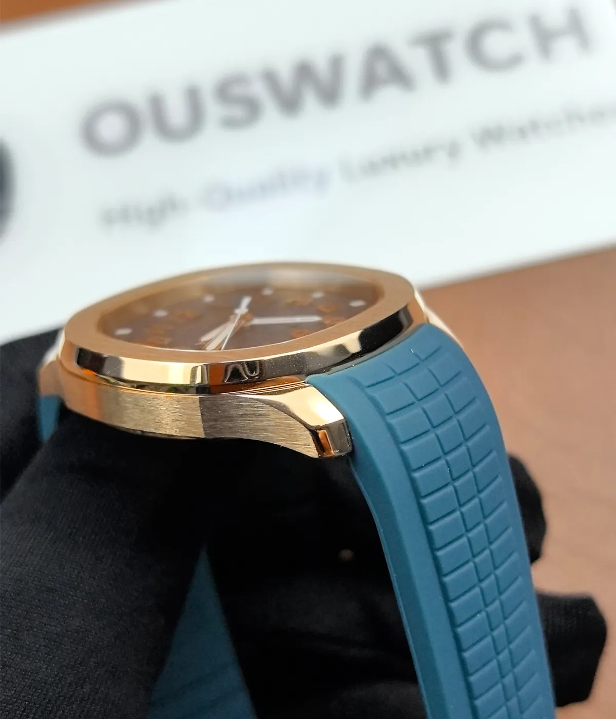 Detailed shot of the strap and lugs of the Patek Philippe Rose Gold Aquanaut 5269R-001, showcasing the high-quality strap and the precision of the lugs.