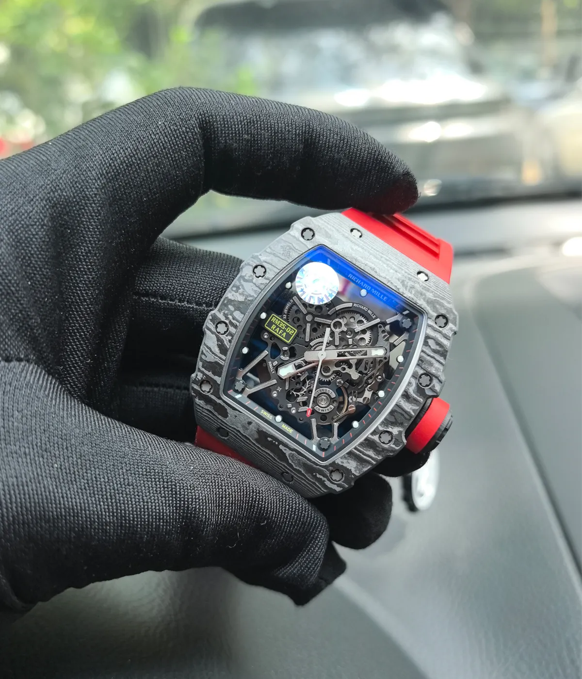 Close-up of the RM 35-02 front, focusing on the dial texture, hands, and material finish.