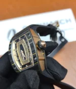 Close-up of the crown on the Richard Mille RM07-01 watch, showing the detailed craftsmanship and design.