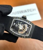 Detailed view of the inner movement of the Richard Mille RM07-01 Quartz Tpt black dial automatic watch.