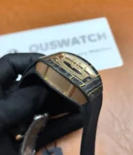 Side view of the Richard Mille RM07-01 Quartz Tpt black dial automatic watch, focusing on the case and satin finish detailing.